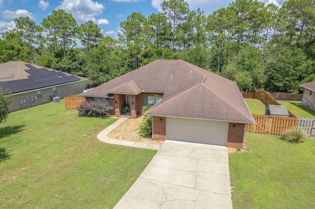 222 Raptor Dr, Crestview, FL 32536 - ranch-style home with brick siding, driveway, an attached garage, and a shingled roof