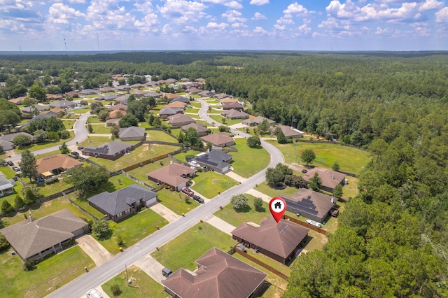 222 Raptor Dr, Crestview, FL 32536 - aerial perspective of suburban area featuring a forest
