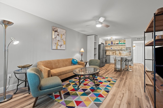 210 Pelham Rd Unit 211B, Fort Walton Beach, FL 32547 - living area featuring light wood-style floors and ceiling fan
