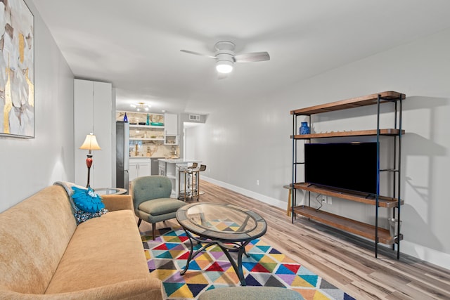 210 Pelham Rd Unit 211B, Fort Walton Beach, FL 32547 - living area with light wood-style floors and a ceiling fan