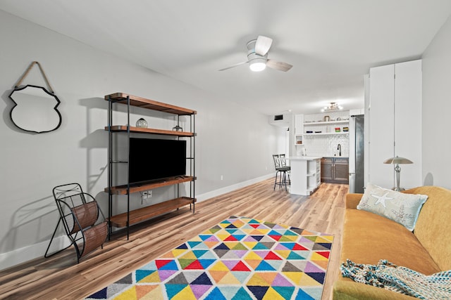 210 Pelham Rd Unit 210B, Fort Walton Beach, FL 32547 - living area with light wood finished floors and a ceiling fan
