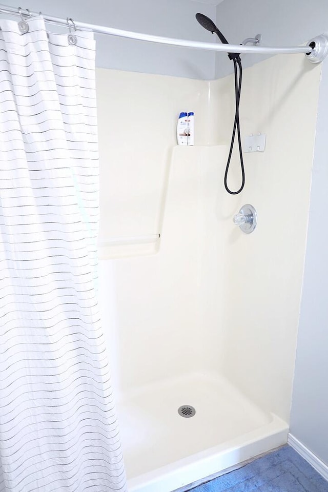 34 5th Ave Unit A, Shalimar, FL 32579 - full bath with a shower with curtain and baseboards