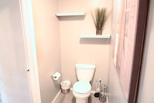 34 5th Ave Unit A, Shalimar, FL 32579 - bathroom with toilet and baseboards