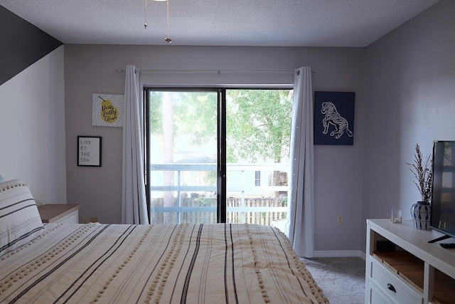 34 5th Ave Unit A, Shalimar, FL 32579 - bedroom featuring light colored carpet and access to exterior