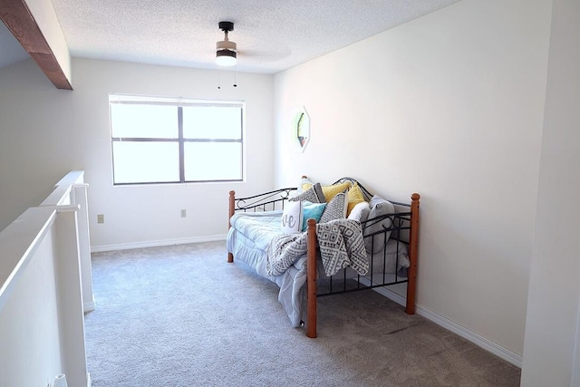 34 5th Ave Unit A, Shalimar, FL 32579 - carpeted bedroom with a textured ceiling and a ceiling fan