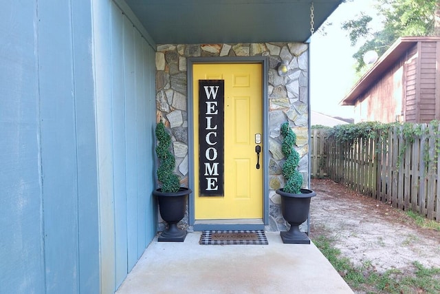34 5th Ave Unit A, Shalimar, FL 32579 - doorway to property featuring stone siding