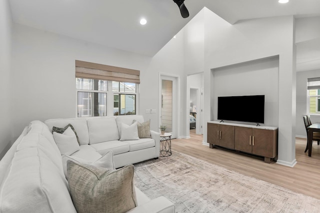 8450 Dreams Float Ct, Panama City Beach, FL 32413 - living area featuring light wood-type flooring, recessed lighting, ceiling fan, and high vaulted ceiling