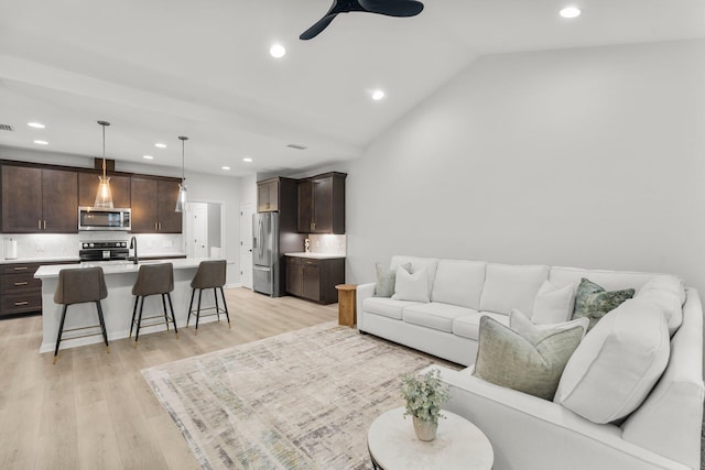 8450 Dreams Float Ct, Panama City Beach, FL 32413 - living area featuring a ceiling fan, light wood finished floors, recessed lighting, and vaulted ceiling
