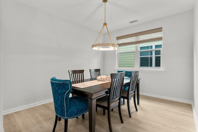 8450 Dreams Float Ct, Panama City Beach, FL 32413 - dining area featuring light wood finished floors