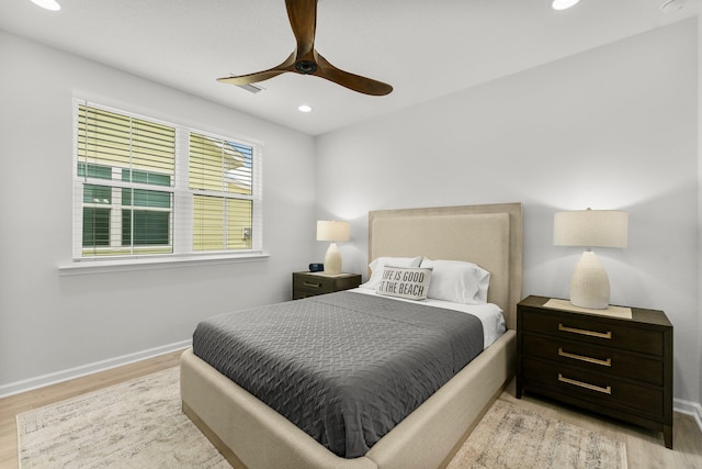 8450 Dreams Float Ct, Panama City Beach, FL 32413 - bedroom featuring wood finished floors, recessed lighting, and a ceiling fan