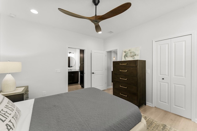 8450 Dreams Float Ct, Panama City Beach, FL 32413 - bedroom featuring light wood finished floors, a closet, ensuite bath, and ceiling fan