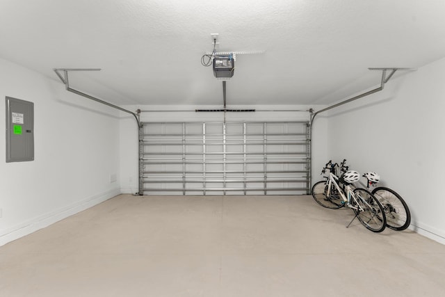 8450 Dreams Float Ct, Panama City Beach, FL 32413 - garage featuring electric panel and a garage door opener