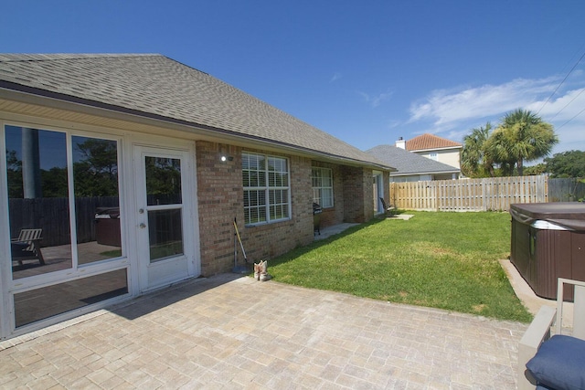 574 Avalon Blvd, Miramar Beach, FL 32550 - fenced backyard featuring a hot tub and a patio