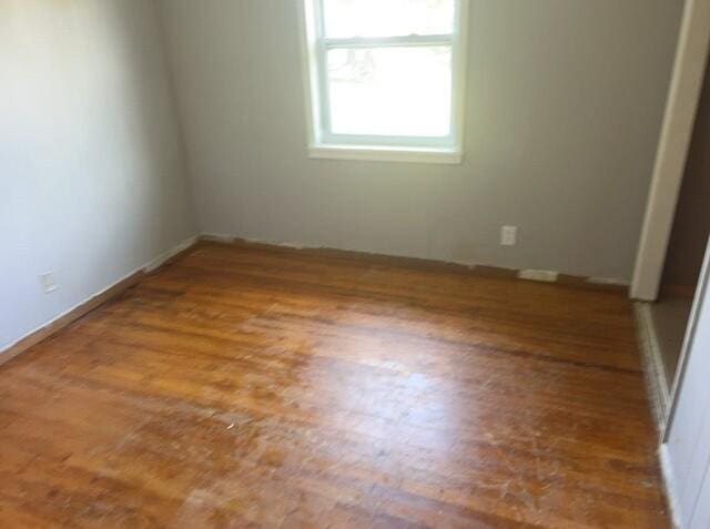 2032 Brogdon St, Grand Ridge, FL 32442 - empty room with wood finished floors