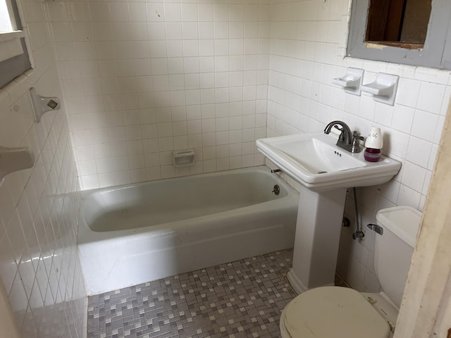 2032 Brogdon St, Grand Ridge, FL 32442 - full bathroom featuring toilet and tile walls