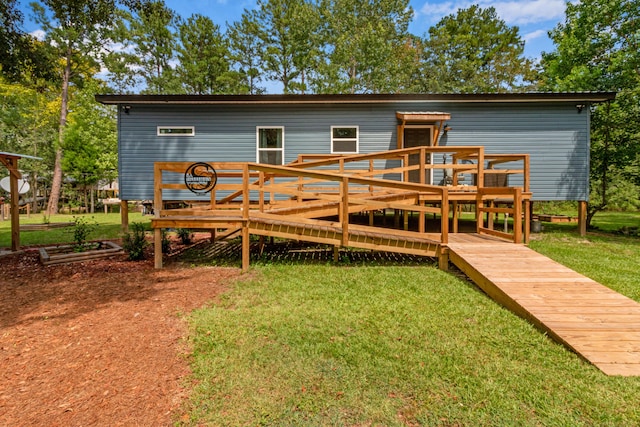 2141 C Shelby Ln, Westville, FL 32464 - back of house with a deck and a lawn