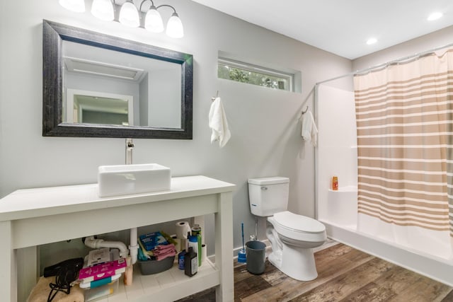 2141 C Shelby Ln, Westville, FL 32464 - bathroom with wood finished floors, curtained shower, vanity, and recessed lighting