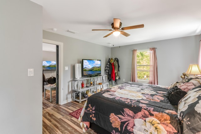 2141 C Shelby Ln, Westville, FL 32464 - bedroom featuring wood finished floors and a ceiling fan