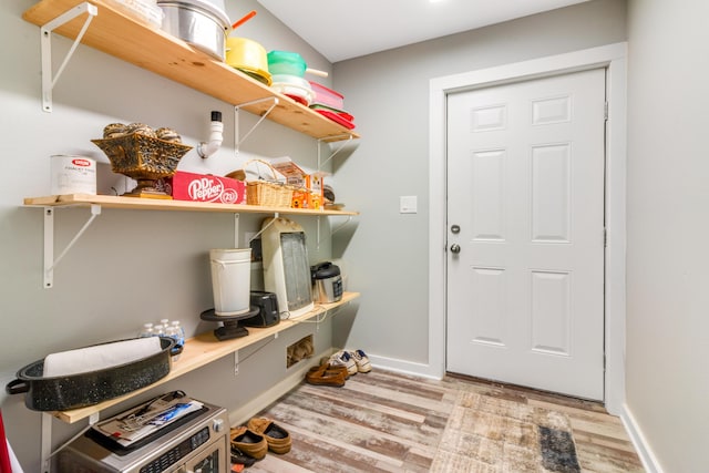 2141 C Shelby Ln, Westville, FL 32464 - washroom featuring wood finished floors and baseboards