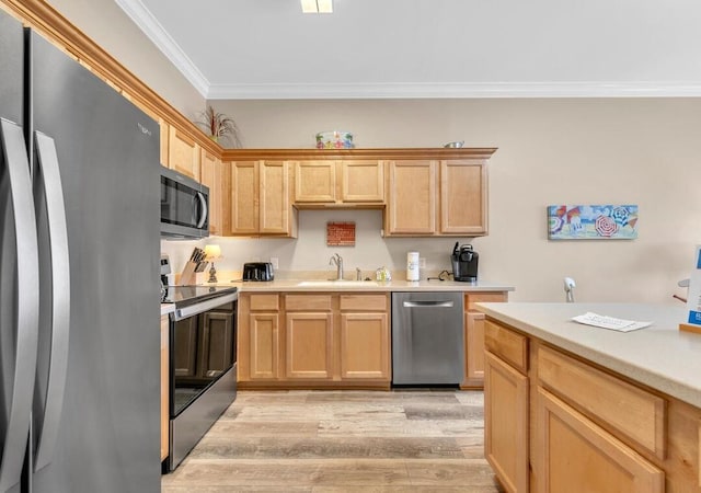 231 Somerset Bridge Rd Unit 2308, Santa Rosa Beach, FL 32459 - kitchen with stainless steel appliances, crown molding, light brown cabinets, light wood-style flooring, and light countertops