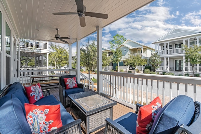 654 Flatwoods Forest Loop, Santa Rosa Beach, FL 32459 - wooden deck with an outdoor hangout area, a ceiling fan, and a residential view