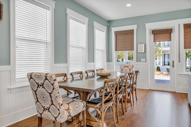 654 Flatwoods Forest Loop, Santa Rosa Beach, FL 32459 - dining room featuring wainscoting, wood finished floors, a decorative wall, and recessed lighting