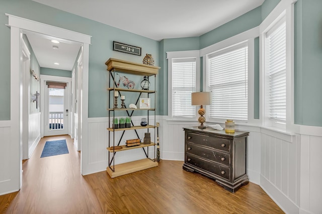654 Flatwoods Forest Loop, Santa Rosa Beach, FL 32459 - interior space featuring wainscoting, wood finished floors, and a decorative wall