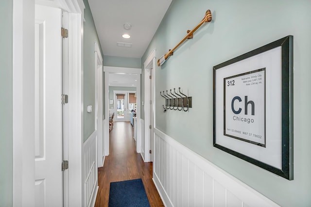654 Flatwoods Forest Loop, Santa Rosa Beach, FL 32459 - hall featuring dark wood-type flooring and wainscoting