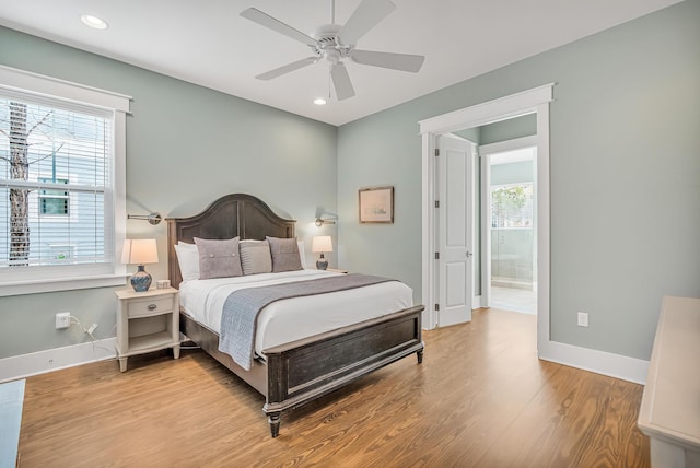 654 Flatwoods Forest Loop, Santa Rosa Beach, FL 32459 - bedroom with multiple windows, light wood-style flooring, recessed lighting, and a ceiling fan