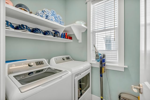 654 Flatwoods Forest Loop, Santa Rosa Beach, FL 32459 - laundry area featuring washer and dryer and healthy amount of natural light