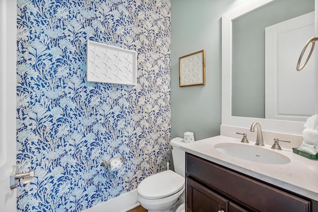 654 Flatwoods Forest Loop, Santa Rosa Beach, FL 32459 - bathroom with vanity and wallpapered walls