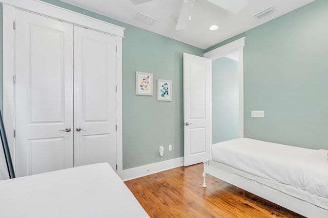 654 Flatwoods Forest Loop, Santa Rosa Beach, FL 32459 - bedroom with light wood-style flooring, a closet, recessed lighting, and ceiling fan