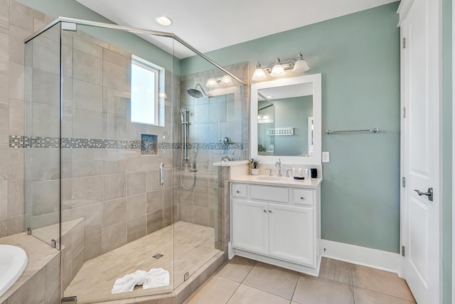 654 Flatwoods Forest Loop, Santa Rosa Beach, FL 32459 - bathroom featuring tile patterned flooring, vanity, a shower stall, and a bath