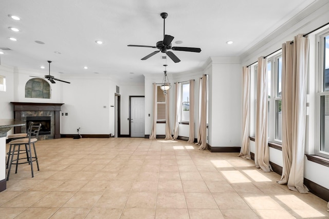 3929 Indian Springs Rd, Panama City, FL 32404 - unfurnished living room featuring a ceiling fan, ornamental molding, recessed lighting, a fireplace, and light tile patterned floors