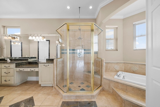 3929 Indian Springs Rd, Panama City, FL 32404 - full bathroom with vanity, a shower stall, a garden tub, tile patterned floors, and crown molding