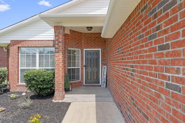 277 Limestone Cir, Crestview, FL 32539 - doorway to property featuring brick siding