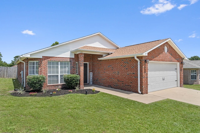 277 Limestone Cir, Crestview, FL 32539 - ranch-style home featuring an attached garage, driveway, brick siding, and a shingled roof