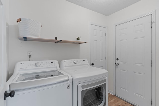 277 Limestone Cir, Crestview, FL 32539 - laundry area featuring independent washer and dryer and light wood-style floors