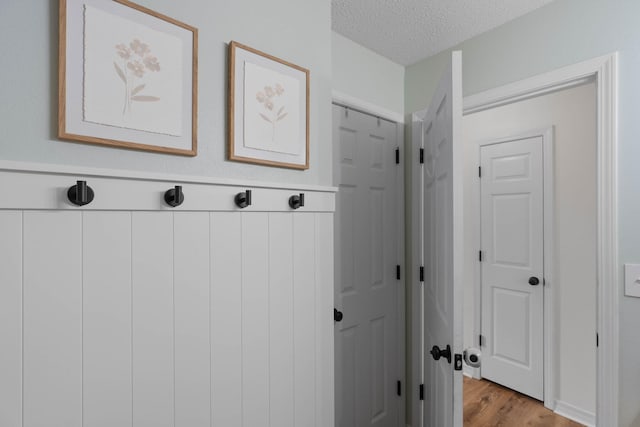 277 Limestone Cir, Crestview, FL 32539 - mudroom with light wood-type flooring and a textured ceiling