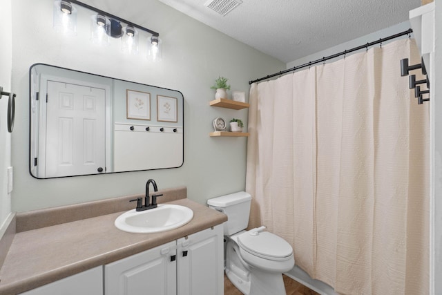 277 Limestone Cir, Crestview, FL 32539 - bathroom with vanity, a textured ceiling, a shower with shower curtain, and wood finished floors