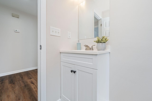 379 W 1st Ave, Crestview, FL 32536 - bathroom featuring vanity and wood finished floors