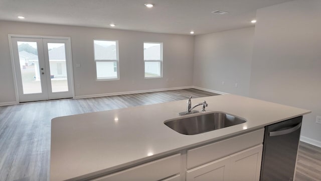 4408 Marine Loop, Crestview, FL 32539 - kitchen with dishwasher, healthy amount of natural light, light countertops, white cabinetry, and recessed lighting