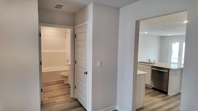 4408 Marine Loop, Crestview, FL 32539 - hall with light wood-style flooring and recessed lighting