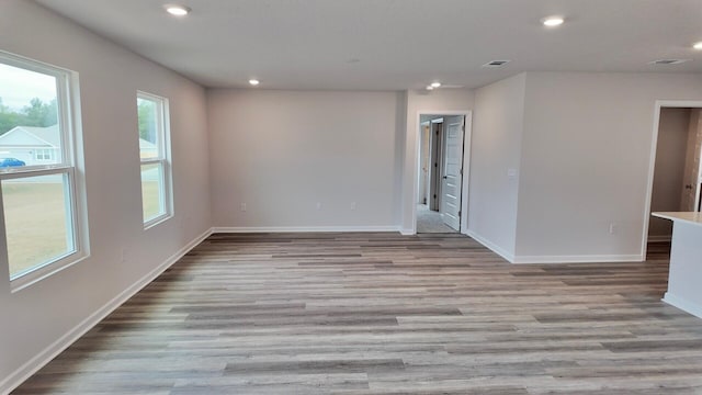 4408 Marine Loop, Crestview, FL 32539 - spare room featuring plenty of natural light, wood finished floors, and recessed lighting