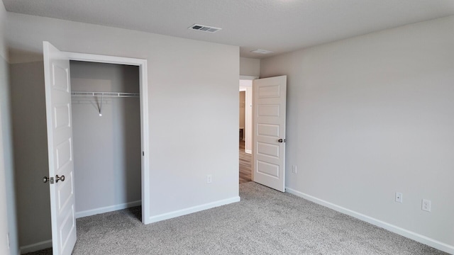 4408 Marine Loop, Crestview, FL 32539 - unfurnished bedroom featuring carpet floors and a closet
