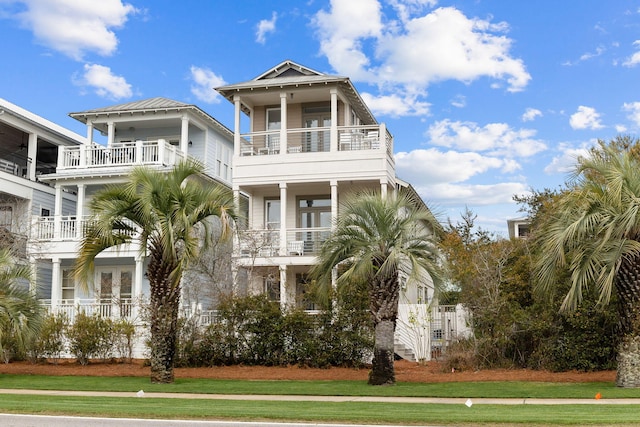 18 E Trigger Trl, Inlet Beach, FL 32461 - coastal home featuring french doors and a balcony