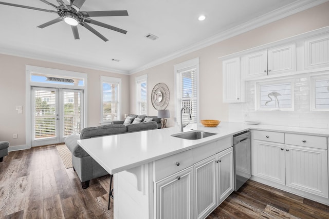 18 E Trigger Trl, Inlet Beach, FL 32461 - kitchen featuring open floor plan, ornamental molding, dark wood-style flooring, white cabinets, and light countertops