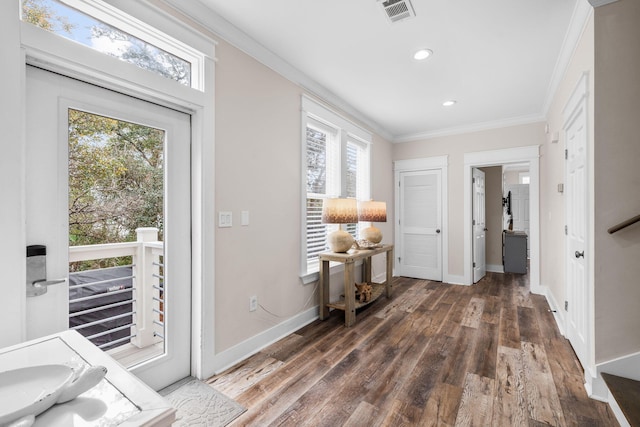 18 E Trigger Trl, Inlet Beach, FL 32461 - foyer entrance featuring ornamental molding, plenty of natural light, wood finished floors, and recessed lighting