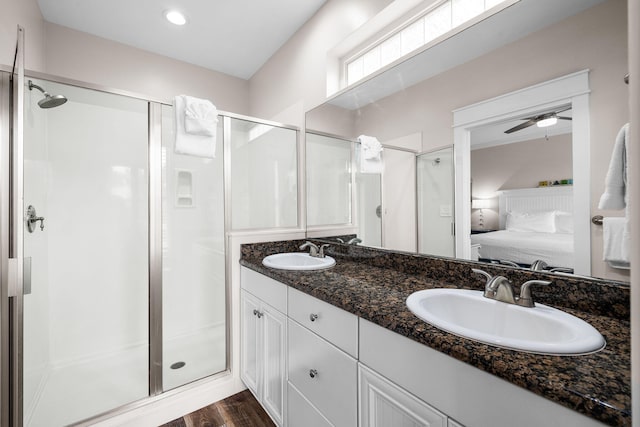 18 E Trigger Trl, Inlet Beach, FL 32461 - ensuite bathroom featuring a shower stall, double vanity, wood finished floors, and ceiling fan