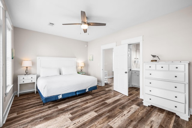 18 E Trigger Trl, Inlet Beach, FL 32461 - bedroom featuring dark wood finished floors, multiple windows, connected bathroom, and a ceiling fan